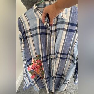 Worn only twice. Linen button down with flower pattern on side.